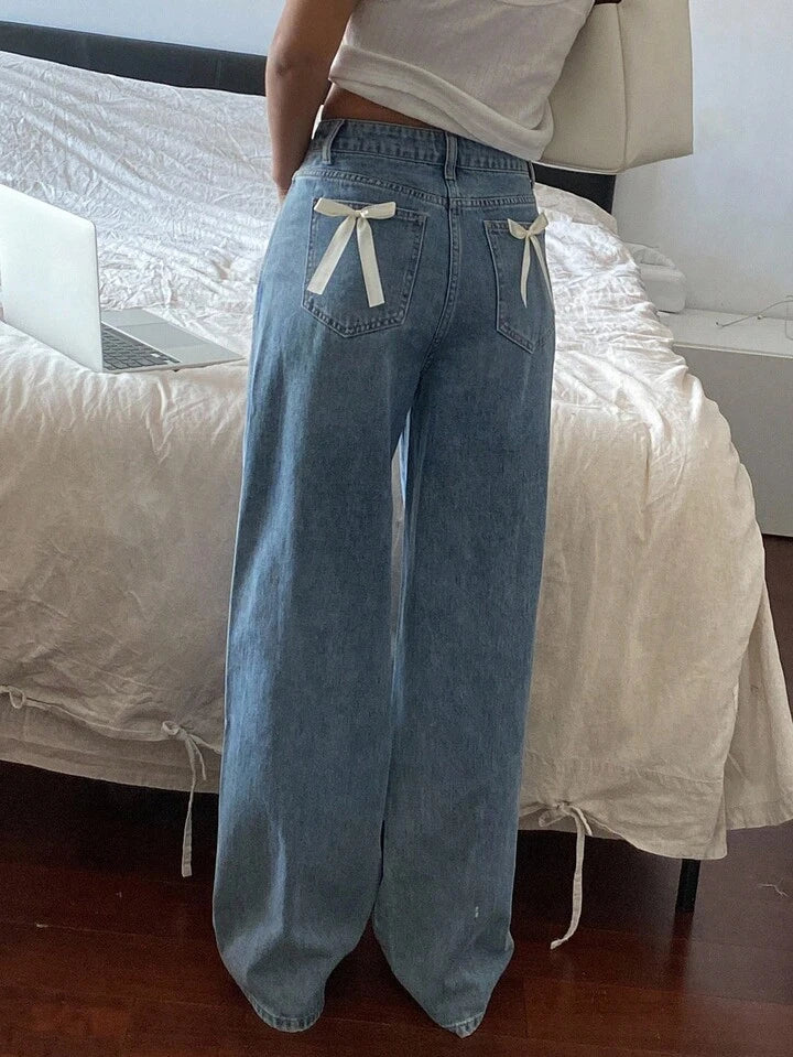 High-Waist Light Wash Wide-Leg Jeans with Bow Accent