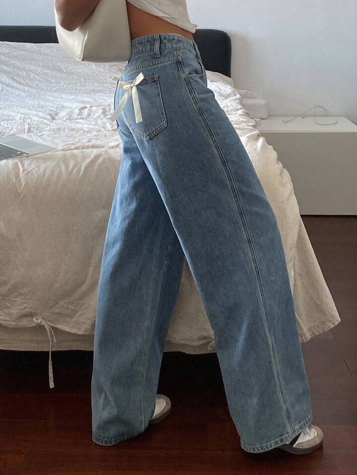 High-Waist Light Wash Wide-Leg Jeans with Bow Accent