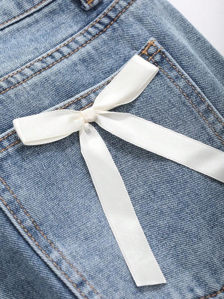 High-Waist Light Wash Wide-Leg Jeans with Bow Accent
