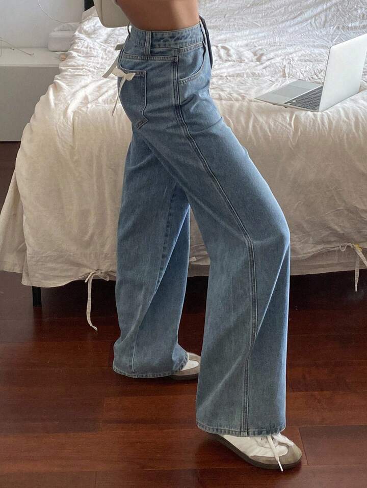 High-Waist Light Wash Wide-Leg Jeans with Bow Accent
